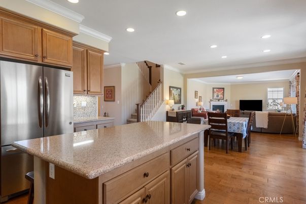 Dining room, Interior, Kitchen, Living room, Recessed Lighting, Stainless Steel Appliances, Wood Texture Flooring