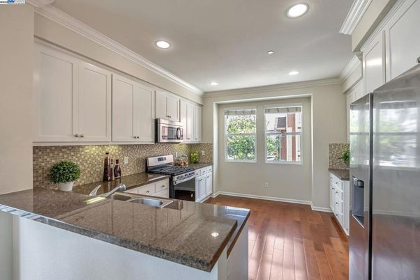 Interior, Kitchen, Recessed Lighting, Stainless Steel Appliances, Wood Texture Flooring