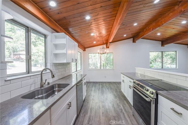 Chandelier, Interior, Kitchen, Recessed Lighting, Stainless Steel Appliances, Wooden Beams, Wooden Ceilings, Wood Texture Flooring