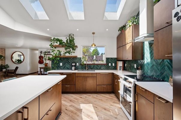 Glass Ceilings, Interior, Kitchen, Pendant Lights, Recessed Lighting, Stainless Steel Appliances, Wood Texture Flooring
