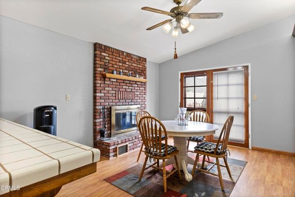 Dining room, Fireplace, Interior, Stone Walls, Wood Texture Flooring