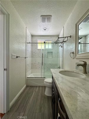 Bathroom, Glass Shower, Interior, Marble Walls, Wood Texture Flooring