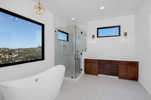 Bathroom, Free Standing Baths, Glass Shower, Interior, Marble, Marble Walls, Pendant Lights, Recessed Lighting