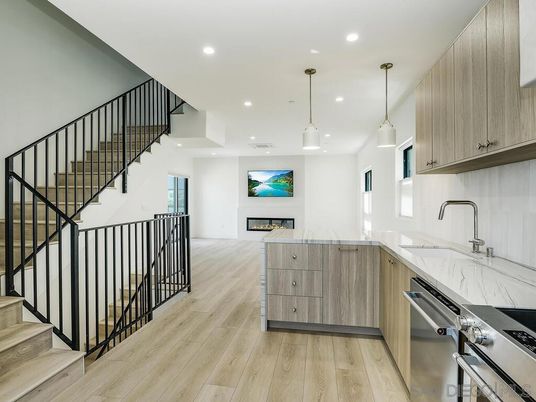 Fireplace, Interior, Kitchen, Pendant Lights, Recessed Lighting, Stainless Steel Appliances, Wood Texture Flooring