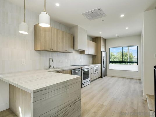 Interior, Kitchen, Pendant Lights, Recessed Lighting, Stainless Steel Appliances, Wood Texture Flooring