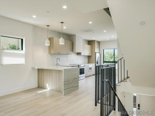 Interior, Kitchen, Pendant Lights, Recessed Lighting, Stainless Steel Appliances, Wood Texture Flooring