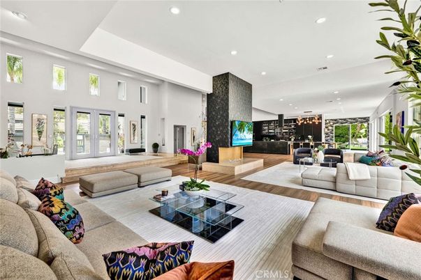 Dining room, Fireplace, Interior, Living room, Pendant Lights, Recessed Lighting, Wood Texture Flooring