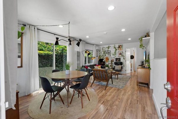 Dining room, Fireplace, Interior, Living room, Pendant Lights, Recessed Lighting, Wood Texture Flooring