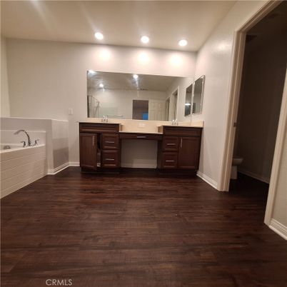 Bathroom, Dual Sink Vanities, Interior, Recessed Lighting, Wood Texture Flooring