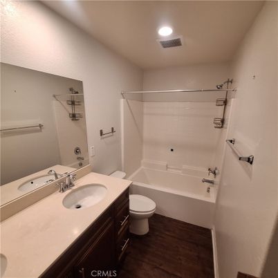 Bathroom, Dual Sink Vanities, Interior, Recessed Lighting, Wood Texture Flooring
