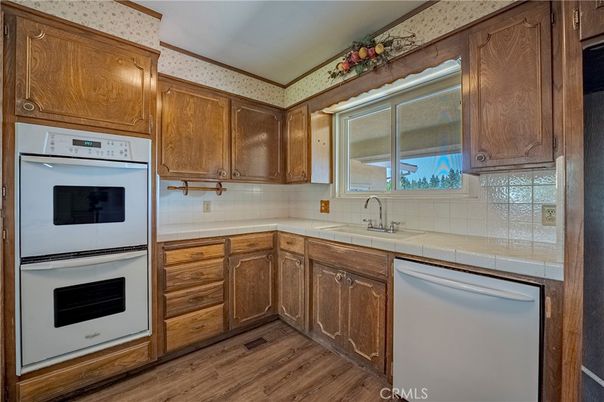 Interior, Kitchen, Tile Countertops, Wood Texture Flooring