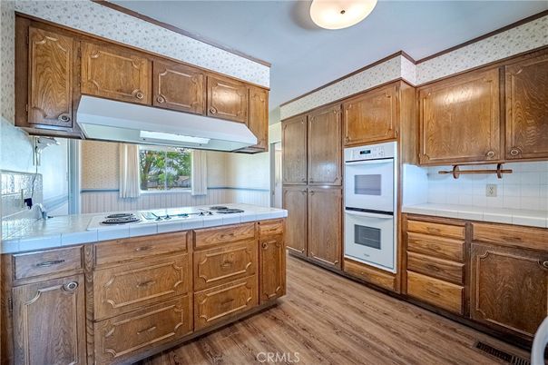 Interior, Kitchen, Tile Countertops, Wood Texture Flooring