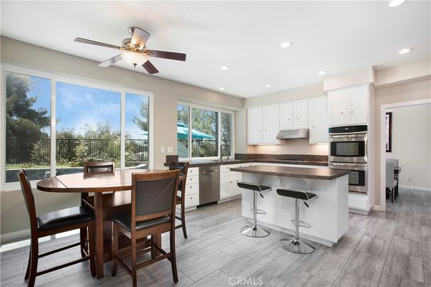 Dining room, Interior, Kitchen, Recessed Lighting, Stainless Steel Appliances, Wood Texture Flooring