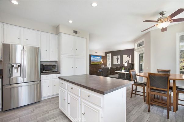 Dining room, Interior, Kitchen, Recessed Lighting, Stainless Steel Appliances, Wood Texture Flooring