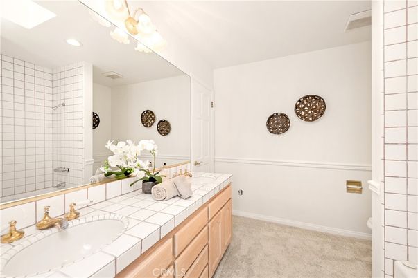 Bathroom, Dual Sink Vanities, Interior, Recessed Lighting, Tile Countertops