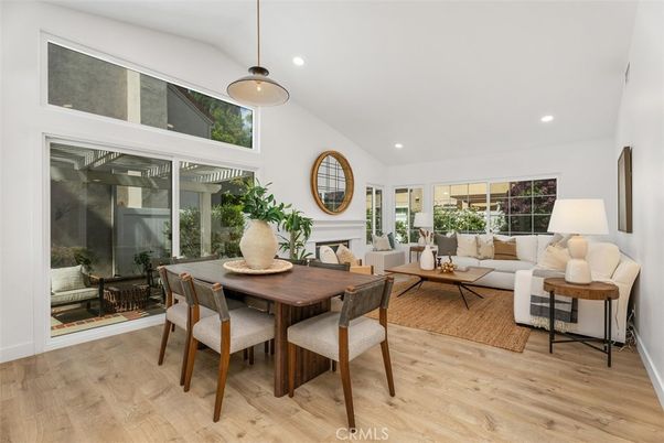 Dining room, Fireplace, Interior, Living room, Pendant Lights, Recessed Lighting, Wood Texture Flooring