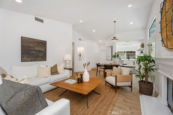 Dining room, Fireplace, Interior, Living room, Pendant Lights, Recessed Lighting, Wood Texture Flooring