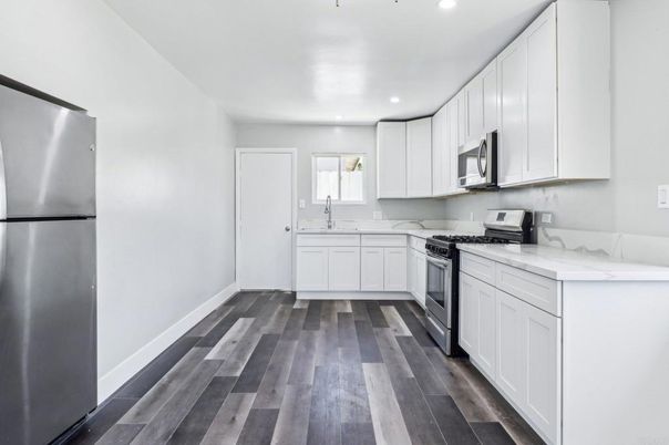 Interior, Kitchen, Recessed Lighting, Stainless Steel Appliances, Wood Texture Flooring