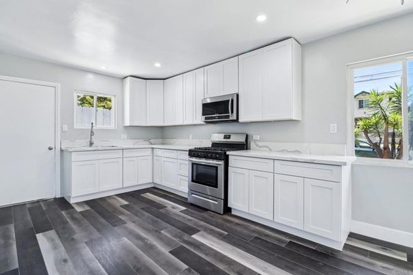 Interior, Kitchen, Recessed Lighting, Stainless Steel Appliances, Wood Texture Flooring