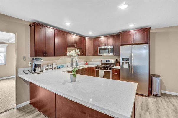 Interior, Kitchen, Recessed Lighting, Stainless Steel Appliances, Wood Texture Flooring