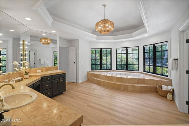 Bathroom, Dual Sink Vanities, Interior, Pendant Lights, Recessed Lighting, Wood Texture Flooring