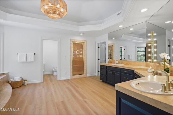 Bathroom, Dual Sink Vanities, Interior, Recessed Lighting, Wood Texture Flooring