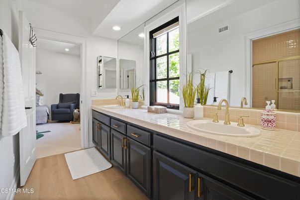 Bathroom, Dual Sink Vanities, Interior, Recessed Lighting, Tile Countertops, Wood Texture Flooring