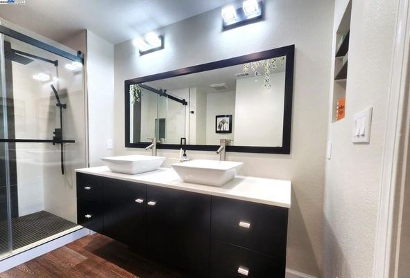 Bathroom, Dual Sink Vanities, Glass Shower, Interior, Wood Texture Flooring