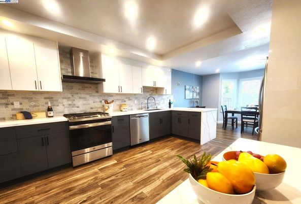 Dining room, Interior, Kitchen, Recessed Lighting, Stainless Steel Appliances, Wood Texture Flooring
