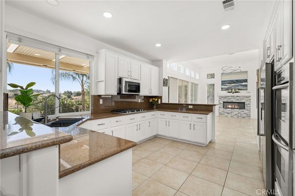 Fireplace, Interior, Kitchen, Pendant Lights, Recessed Lighting, Stainless Steel Appliances