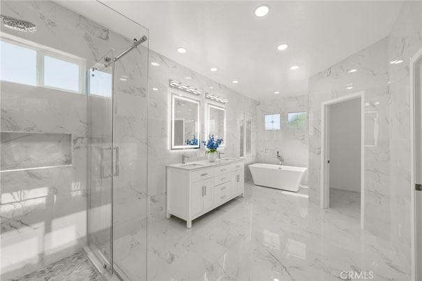 Bathroom, Dual Sink Vanities, Free Standing Baths, Glass Shower, Interior, Marble, Marble Walls, Recessed Lighting