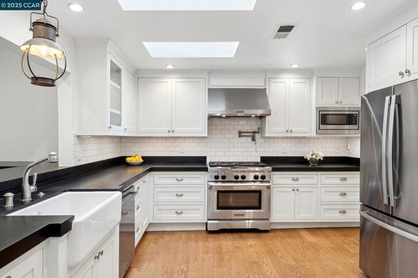Interior, Kitchen, Recessed Lighting, Stainless Steel Appliances, Wood Texture Flooring