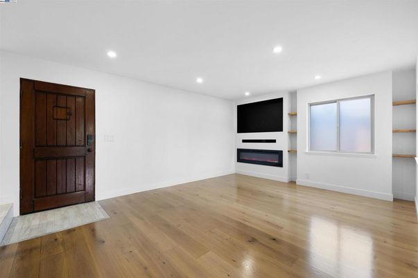 Empty room, Fireplace, Interior, Recessed Lighting, Wood Texture Flooring