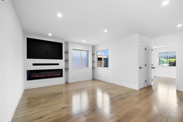 Empty room, Fireplace, Interior, Recessed Lighting, Wood Texture Flooring