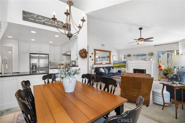Chandelier, Dining room, Fireplace, Interior, Kitchen, Living room, Recessed Lighting, Stainless Steel Appliances