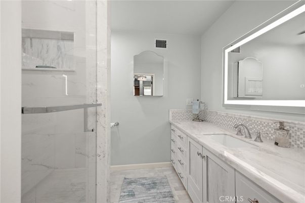 Bathroom, Dual Sink Vanities, Glass Shower, Interior, Marble Walls