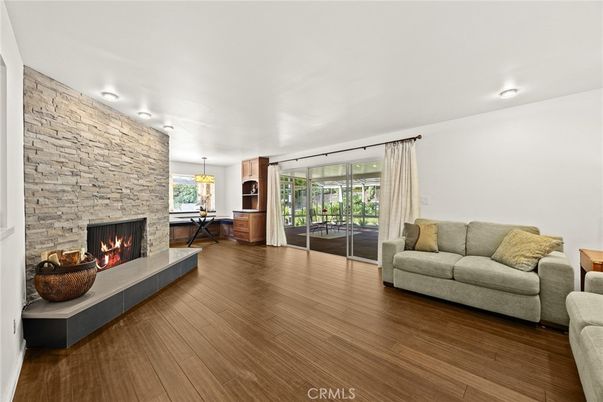 Fireplace, Interior, Pendant Lights, Recessed Lighting, Stone Walls, Wood Texture Flooring