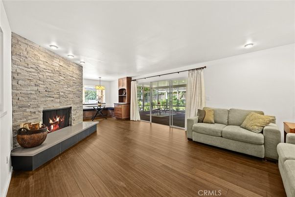 Fireplace, Interior, Pendant Lights, Recessed Lighting, Stone Walls, Wood Texture Flooring