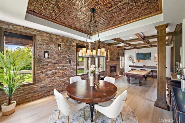 Billiard Table, Dining room, Fireplace, Game Room, Interior, Pendant Lights, Recessed Lighting, Stone Walls, Wooden Beams, Wood Texture Flooring