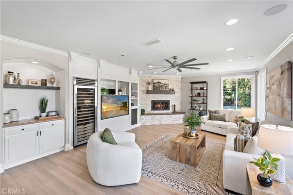 Fireplace, Interior, Living room, Recessed Lighting, Stone Walls, Wood Texture Flooring