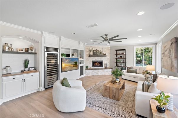 Fireplace, Interior, Living room, Recessed Lighting, Stone Walls, Wood Texture Flooring