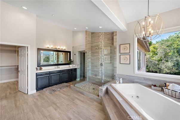 Bathroom, Chandelier, Glass Shower, Interior, Pendant Lights, Recessed Lighting, Wood Texture Flooring