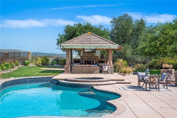 Exterior, Fireplace, Pool
