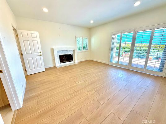 Empty room, Fireplace, Interior, Recessed Lighting, Wood Texture Flooring