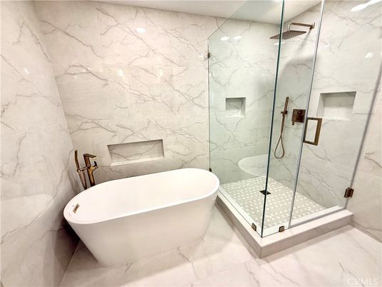 Bathroom, Free Standing Baths, Glass Shower, Interior, Marble, Marble Walls, Recessed Lighting