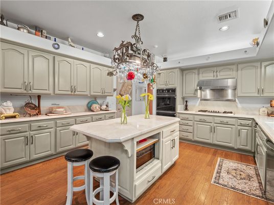 Chandelier, Interior, Kitchen, Recessed Lighting, Stainless Steel Appliances, Wood Texture Flooring