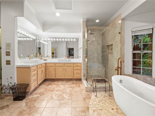 Bathroom, Dual Sink Vanities, Free Standing Baths, Glass Shower, Interior, Marble Walls, Recessed Lighting