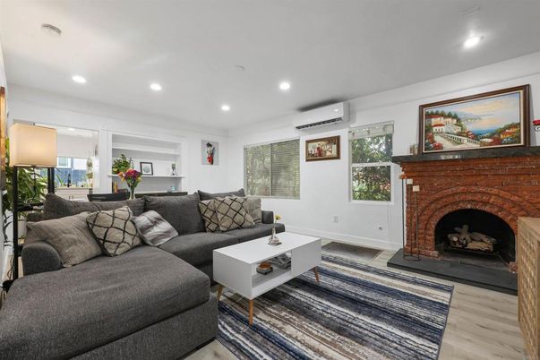 Fireplace, Interior, Living room, Recessed Lighting, Wood Texture Flooring