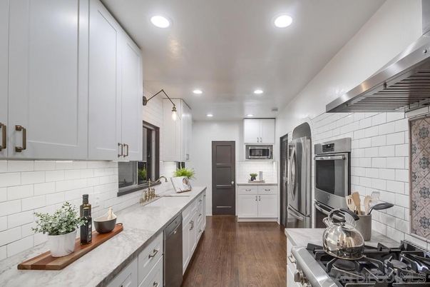 Interior, Kitchen, Pendant Lights, Recessed Lighting, Stainless Steel Appliances, Wood Texture Flooring