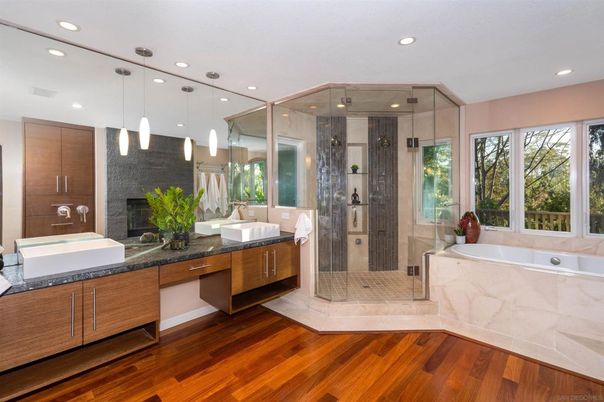 Bathroom, Dual Sink Vanities, Glass Shower, Interior, Pendant Lights, Recessed Lighting, Wood Texture Flooring